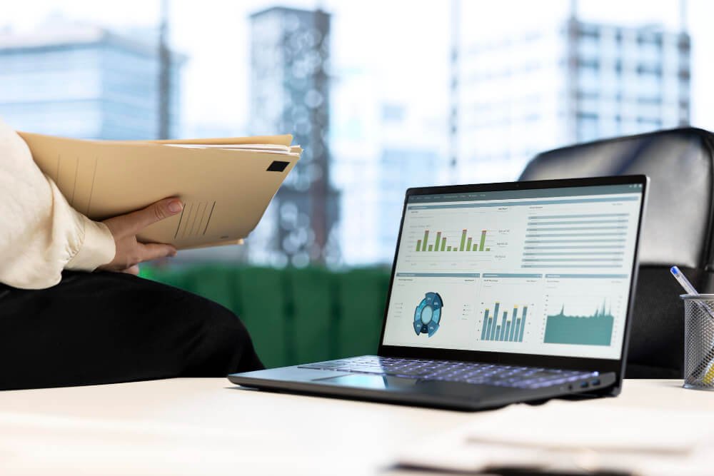 Citation tracking and reporting dashboard on a phone and laptop
