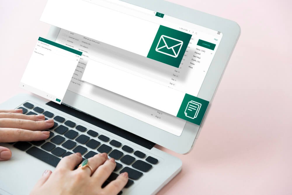 Email automation workflow on a laptop screen