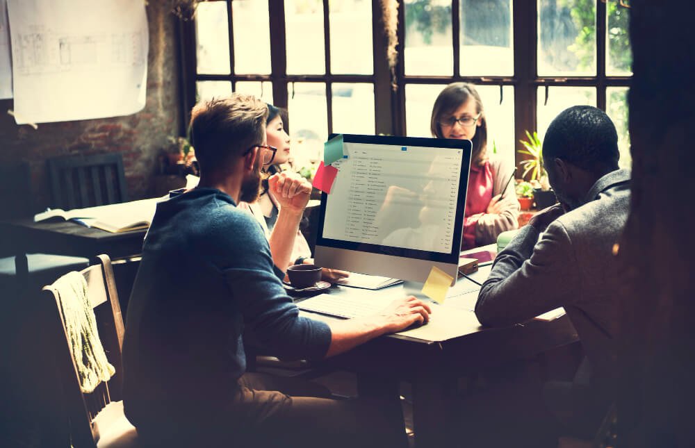Team reviewing a 90-day SEO and content blueprint together