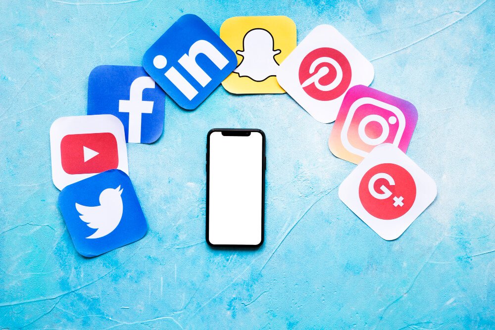 Social media content planning on a phone and laptop
