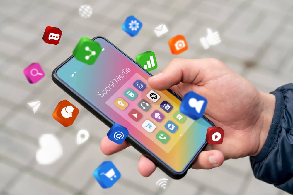 Marketers reviewing social media performance together