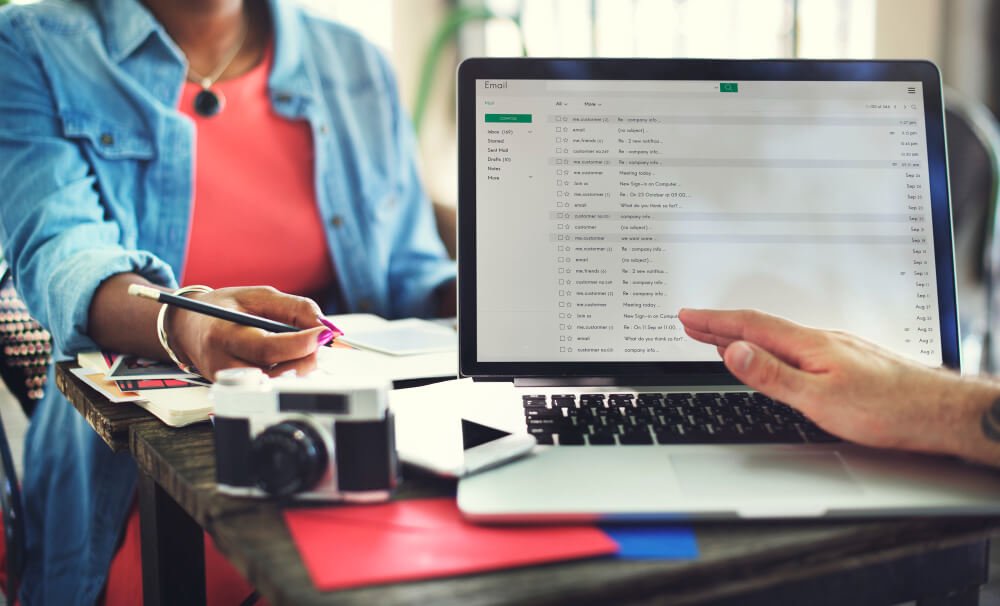Team mapping out a 90-day email marketing and flow plan